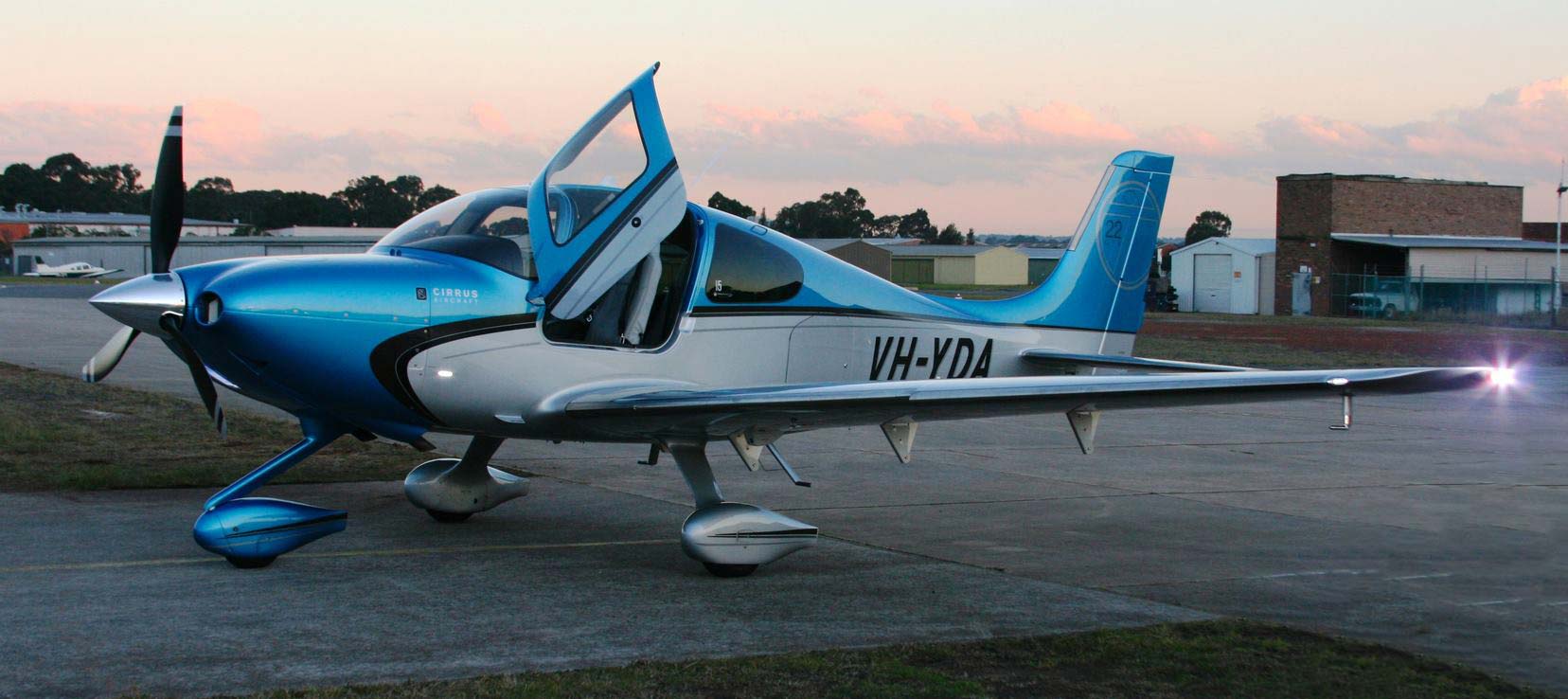 video library blue and silver Cirrus aircraft on the tarmac video library blue and silver Cirrus aircraft on the tarmac