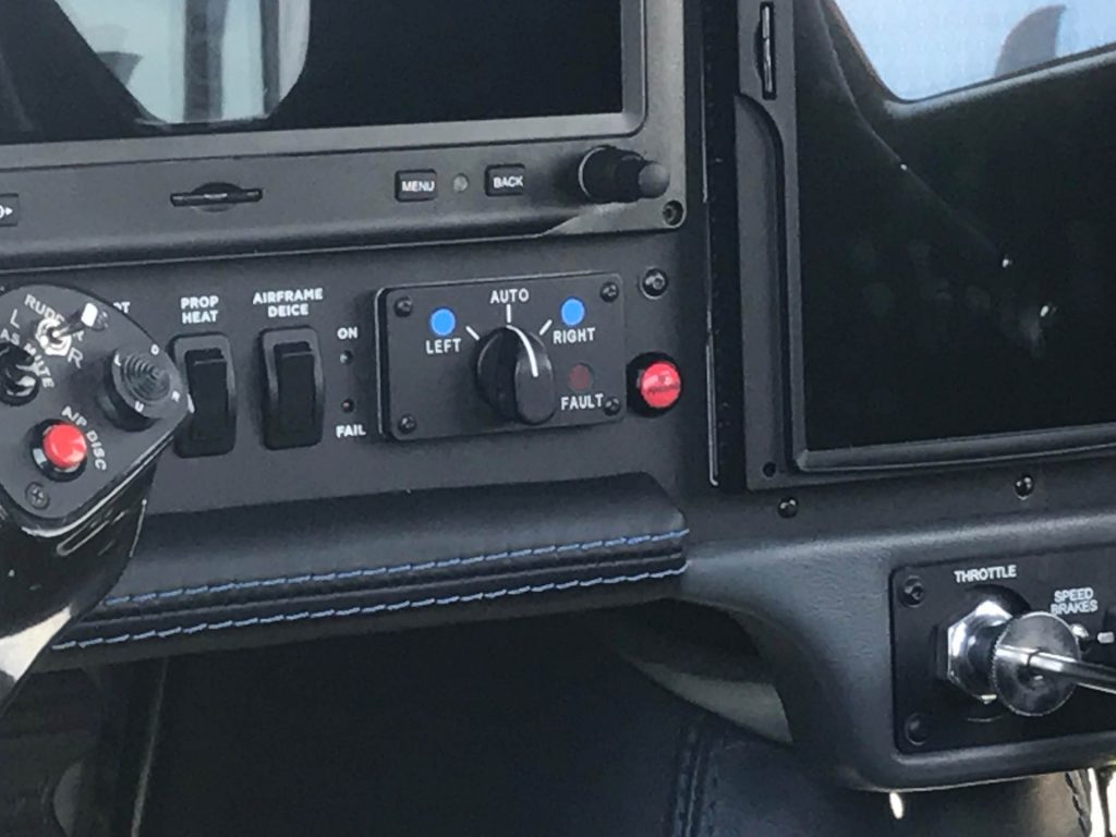 Fuel System Components in the cockpit next to other controls