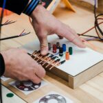 technician testing frequency output multimeter
